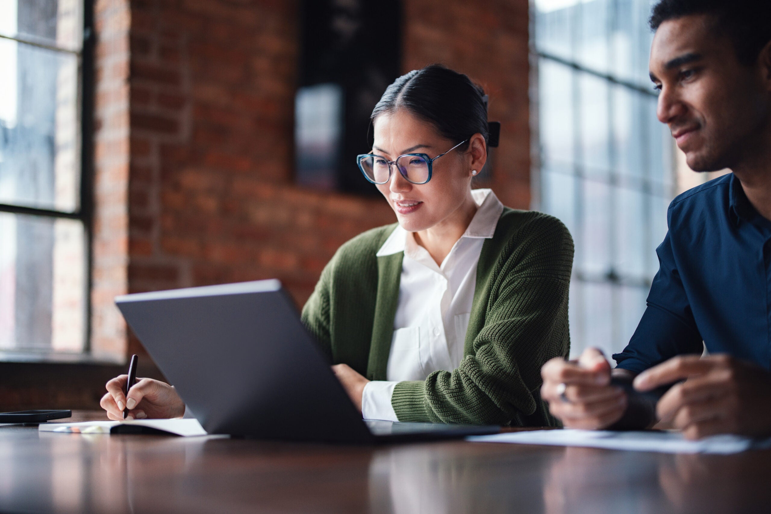 Team collaborating to navigate candidate fraud risks.